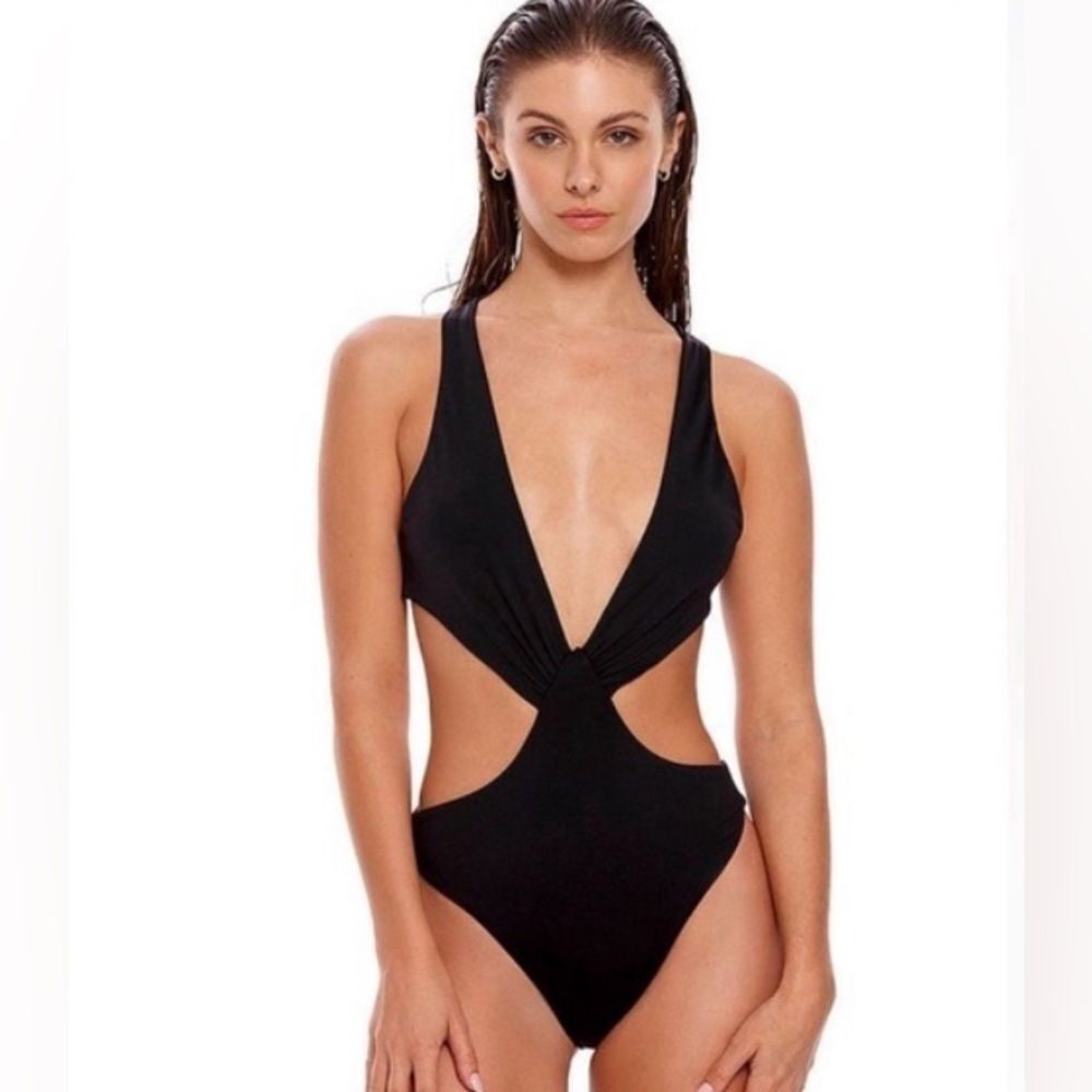 AGUA BENDITA This is an all-time best seller! Everyone's favorite one piece!!